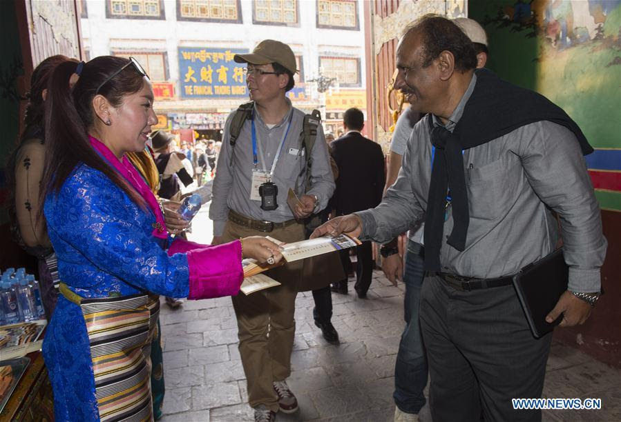 LHASA, July 4, 2016 (Xinhua) -- Foreign expert representatives visit an ancient building in Lhasa, capital of southwest China