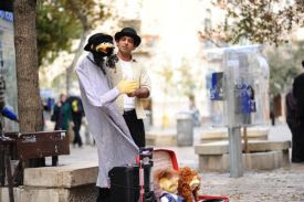 A man and his puppet on Ben-Yehuda Street in Jerusalem.