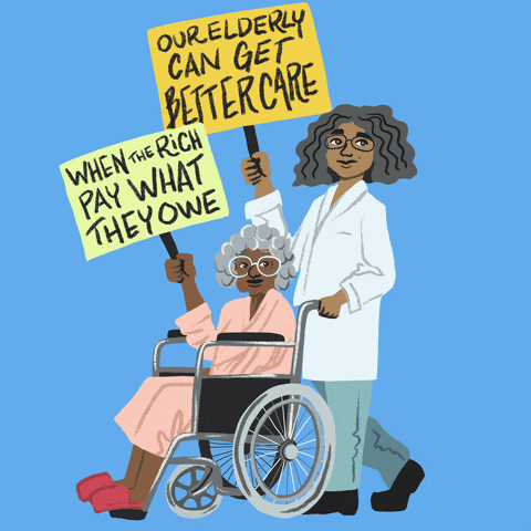 One woman in a wheelchair and one pushing the chair holding signs that say "Our elderly can get better healthcare when the rich pay what they owe"