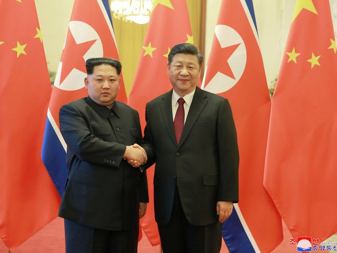 KCNA công bố loạt ảnh mãn nhãn về chuyến thăm Trung Quốc của nhà lãnh đạo Kim Jong-un - Ảnh 4.