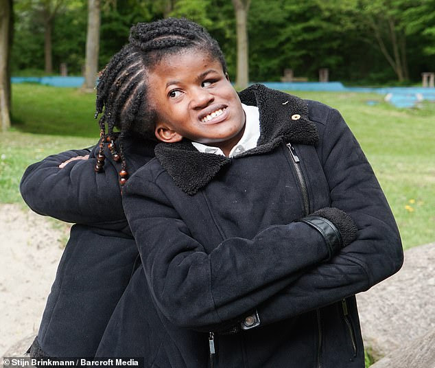 Medics were convinced the girls would die shortly after birth, and if they survived, it was expected their life would be a struggle before dying around the age of ten - but they are thriving at the age of 18. Pictured at a local park