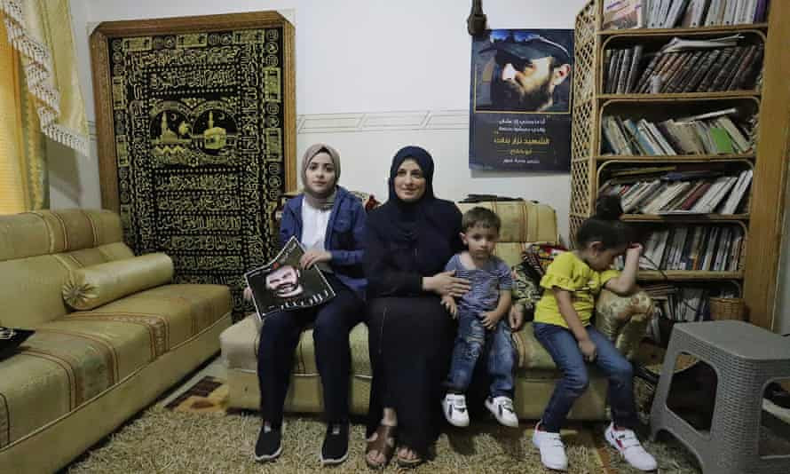 Jihan and three of her children at their home in Dura