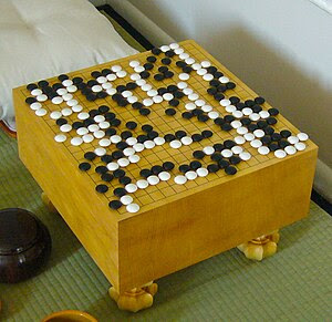 photograph of Go equipment with game in progress