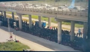 WATCH: New Drone Video Shows Herds of Immigrants Being Held Under Bridge in Texas