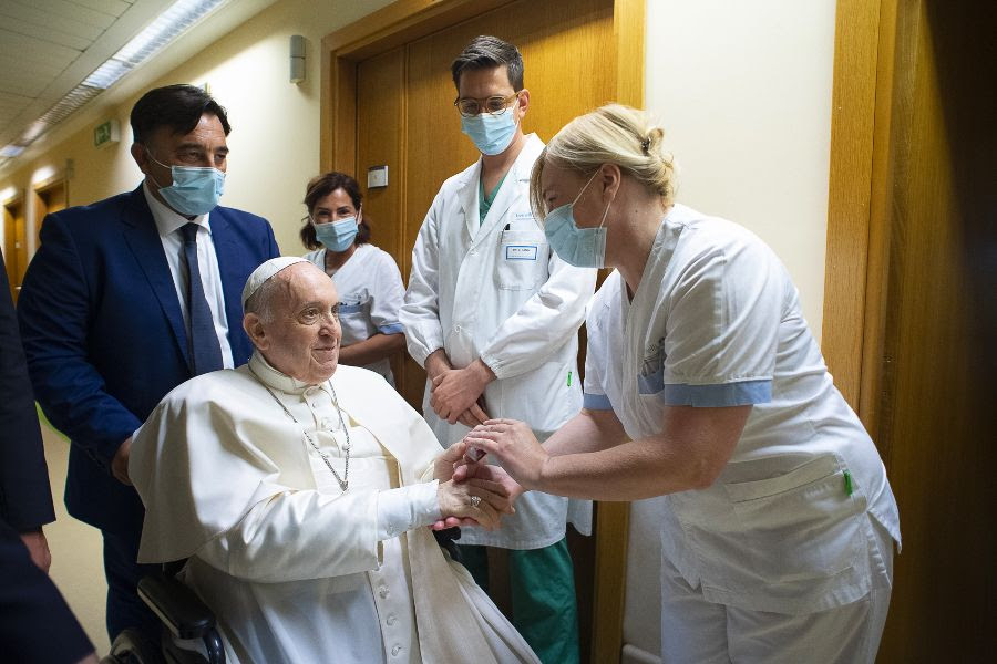 Pope Francis greets staff at the Gemelli Hospital in Rome, July 11, 2021.