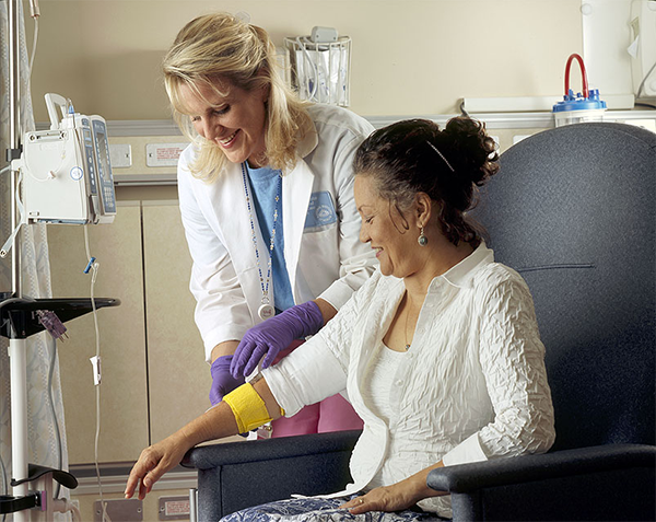 nurse bandages chemotherapy patient