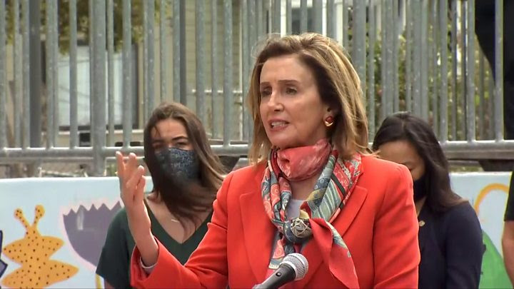 Nancy Pelosi speaking outside