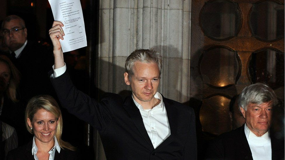 Julian Assange outside the High Court in December 2010