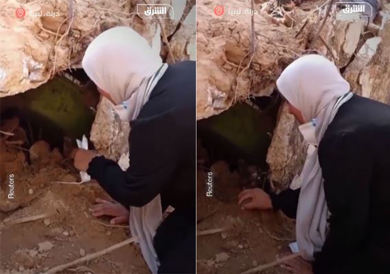 شاهد فيديو مؤثر لـ امرأة ليبية تنبش عن جثث عائلتها تحت الركام