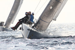 J/80 sailing off Italy