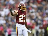 Washington Redskins cornerback Quinton Dunbar (23) gestures during the first half of an NFL football game against the New England Patriots, Sunday, Oct. 6, 2019, in Washington. (AP Photo/Nick Wass) ** FILE **