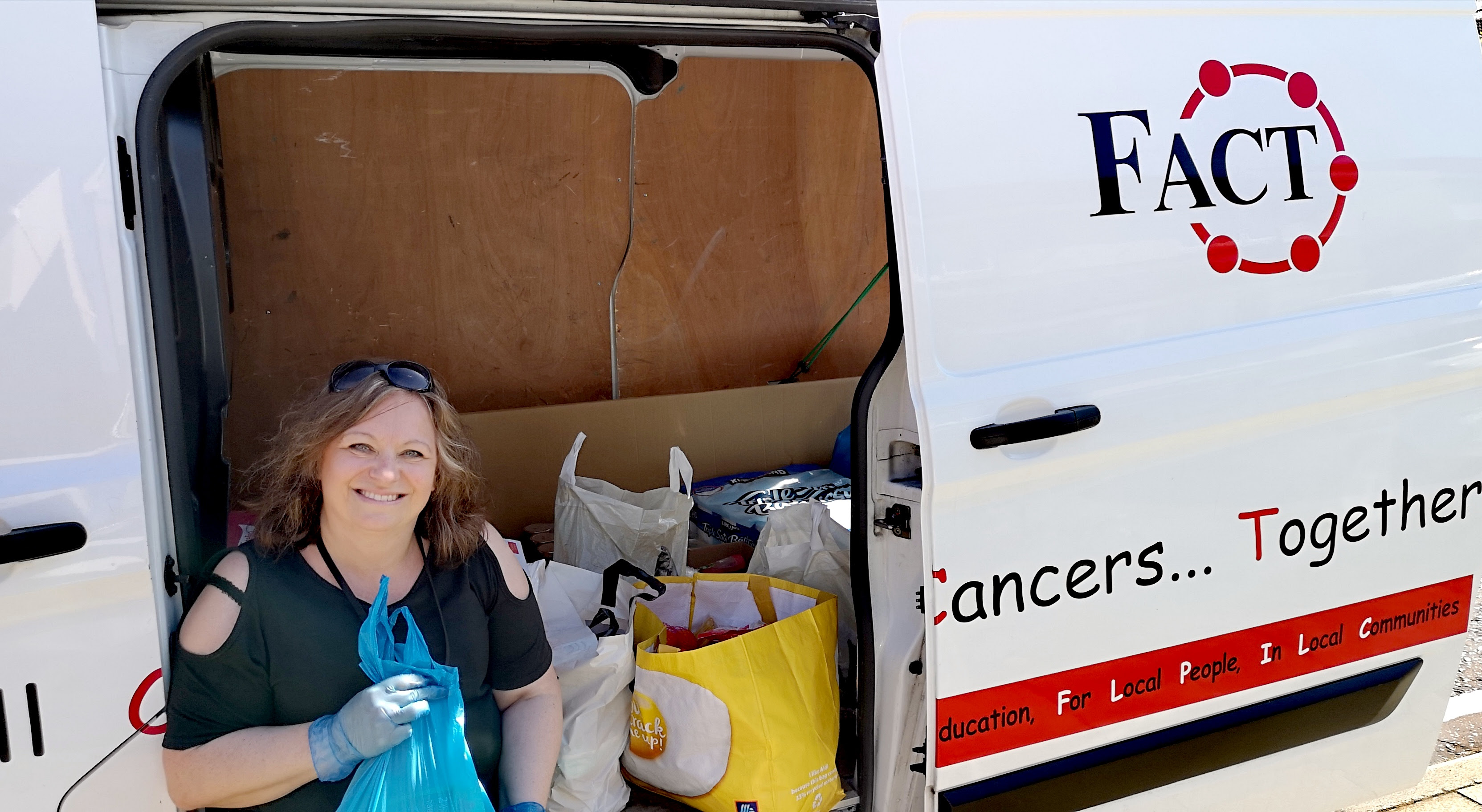 FACT Founder and Chief Executve Joanne Smith making doorstep food donations