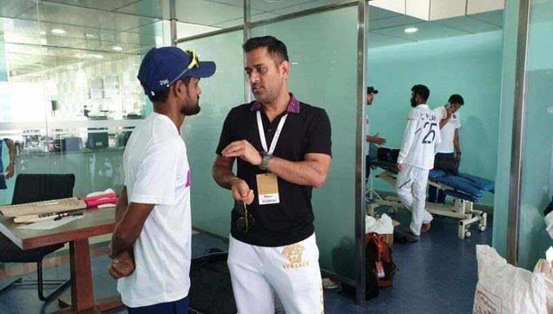 MS Dhoni with Shahbaz Nadeem in the dressing room after the 3rd test at Ranchi