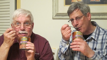 Tim tasting baked beans from a can