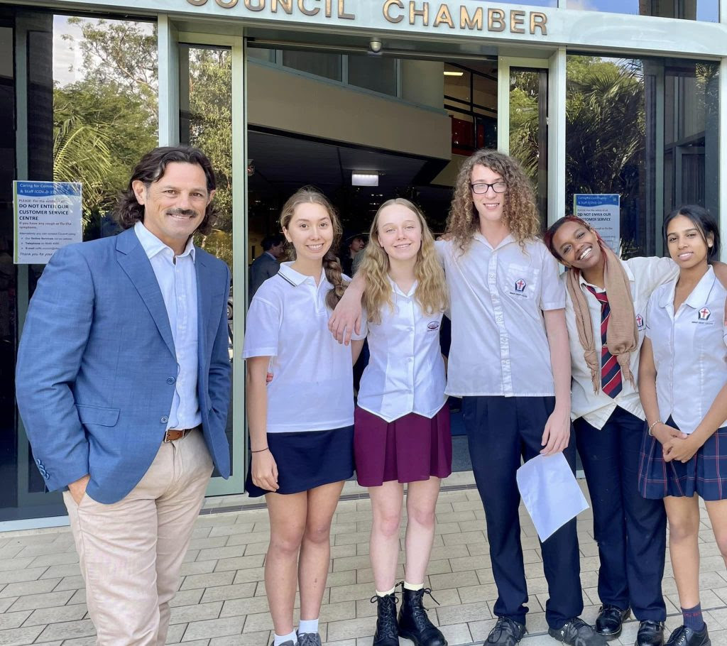 Coffs Youth Climate Alliance members with Councillor Cassell after council Climate Emergency Declaration