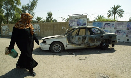 A burnt car on the site where Blackwater guards who were escorting US embassy officials opened fire in 2007.