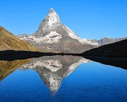 Riffelsee lake with Matterhorn reflection in Zermatt, Switzerland during fall