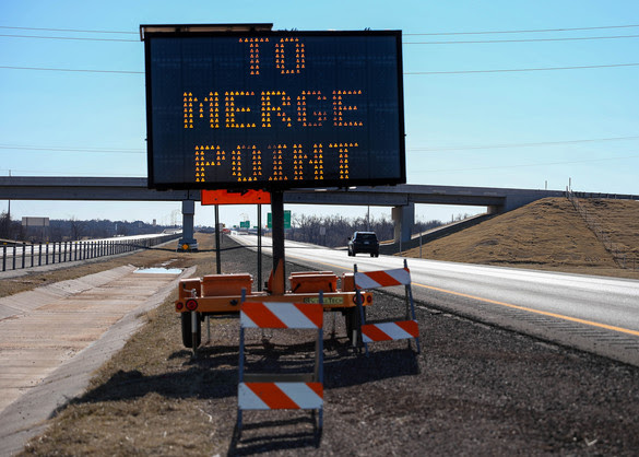 Zipper merge sign "To Merge Point" 