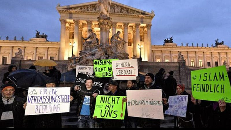 Protesters gathered outside the parliament in Vienna to protest against the new law [EPA]