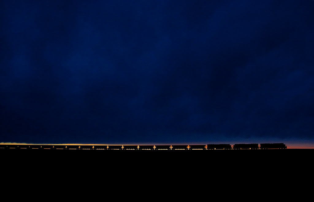 http://twistedsifter.com/2013/03/coal-train-at-sunset-powder-river-basin/