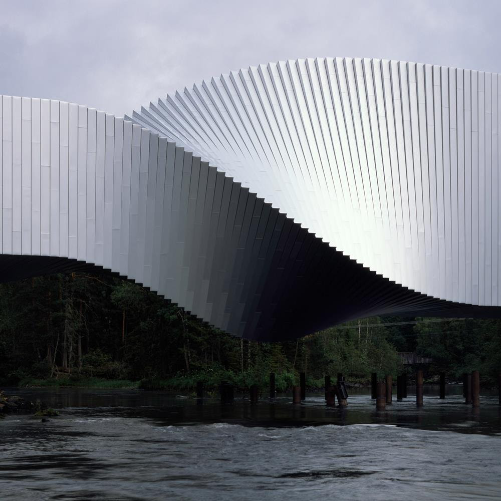 BIG bridges river in Norway with twisting art gallery