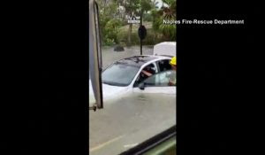 Dramatic Video Shows Woman’s Rescue From Submerged Car