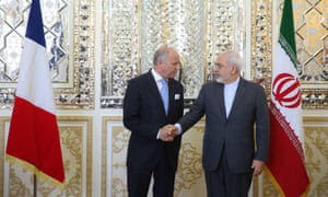 French foreign minister Laurent Fabius shakes hands with Mohammad Javad Zarif,  his Iranian counterpart, during a visit to Tehran in July.