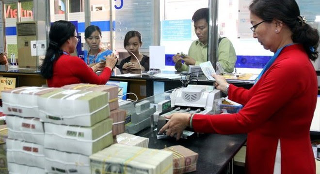 Ngân hàng được giữ nguyên nhóm nợ đối với khoản nợ cơ cấu lại đến 31/3/2015