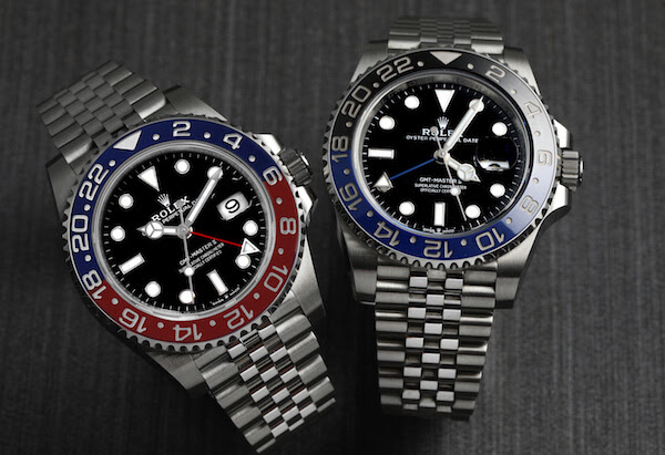 2018 Rolex GMT Master II Pepsi 126710 BLRO beside the Batman 126710 BLNR