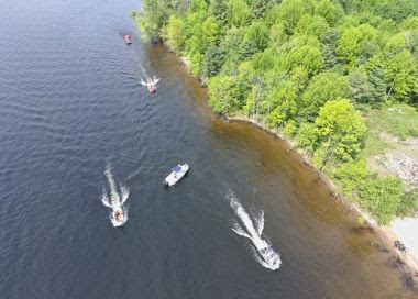 aerial view of boats on the water during training