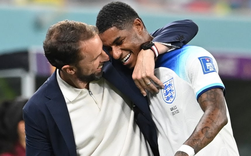 Gareth southgate, the england manager, congratulates Marcus rashford after his two goals helped the team to a 3-0 win over wales at the world Cup in Qatar last night