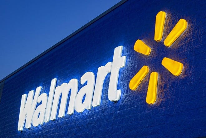 Lighted Walmart sign.