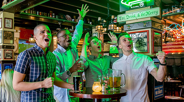 A group of men having fun at McGillin's Olde Ale House