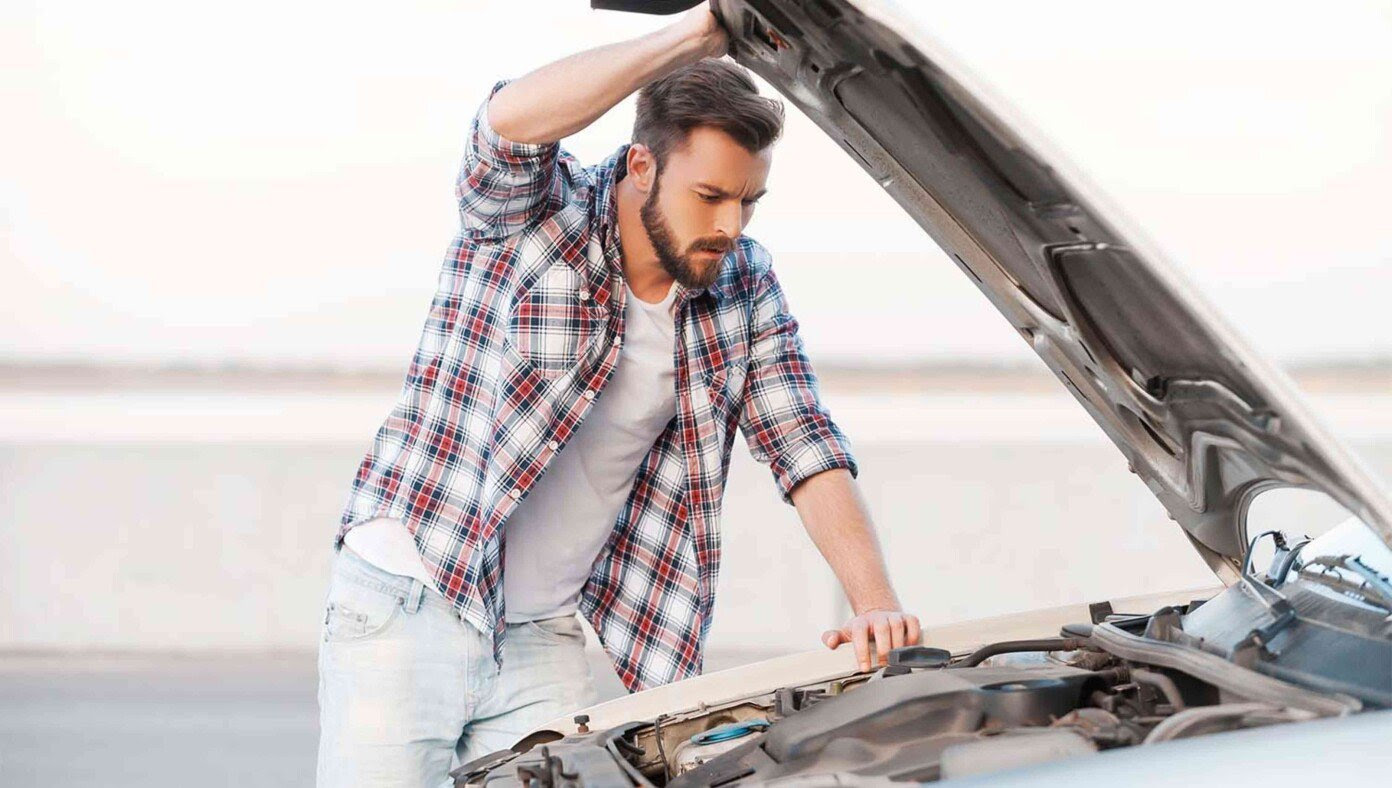 Man Pops Car Hood, Thus Exhausting His Knowledge Of How Cars Work