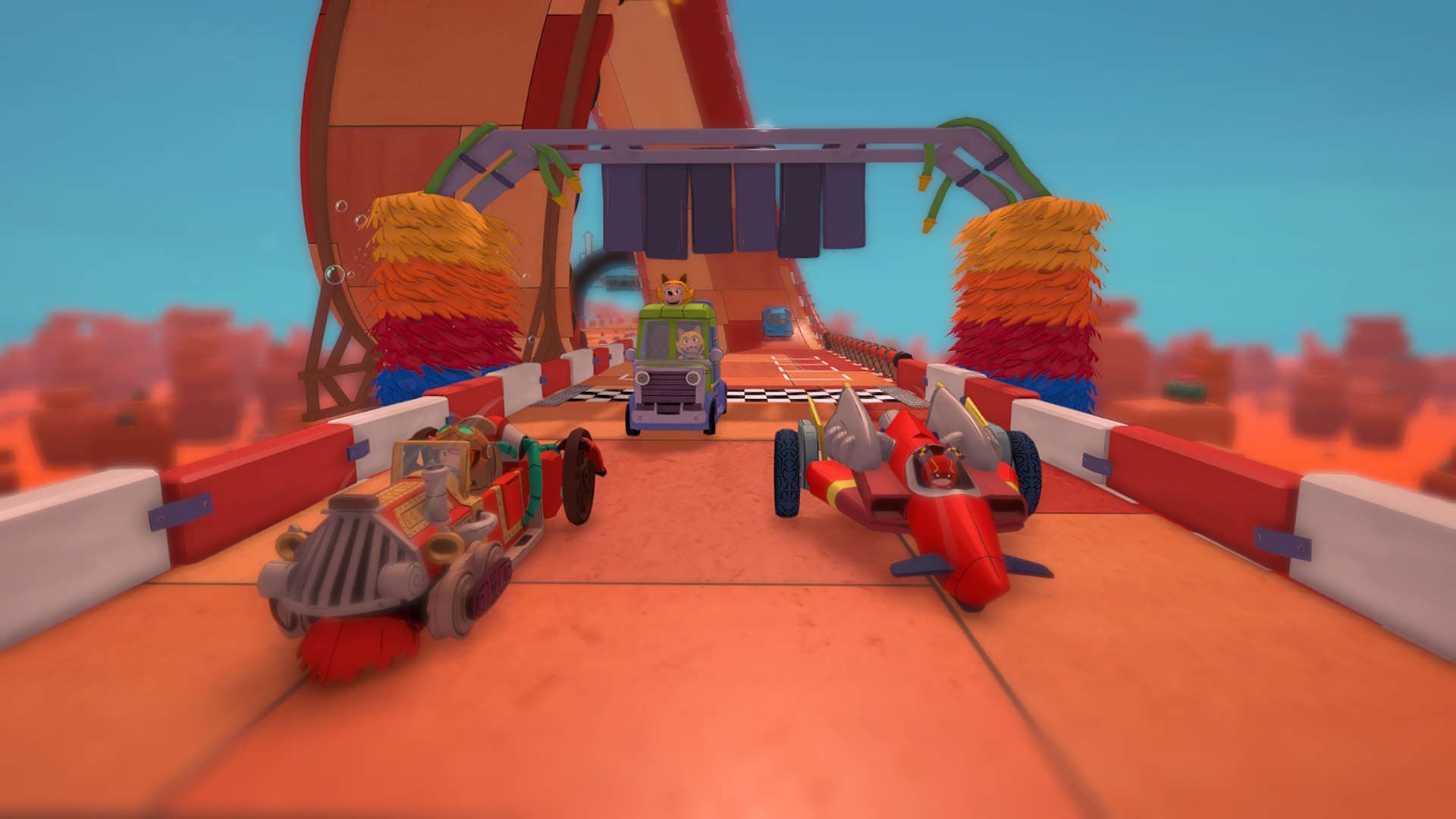 Four cars race towards the screen in a desert area in Make Way