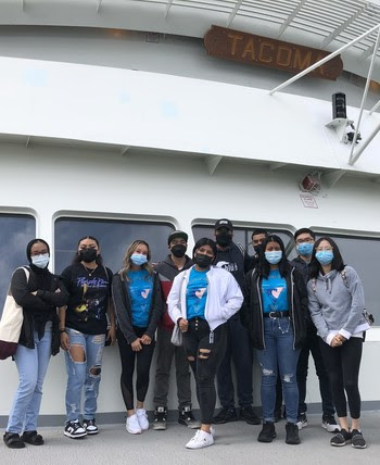 Photo of children on outdoor deck of ferry Tacoma