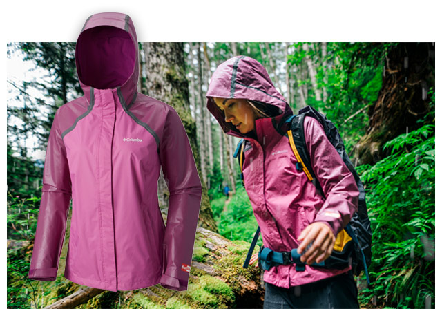 A woman in the rain wearing a pink OutDry Hybrid Jacket.  Close-up of the jacket. 