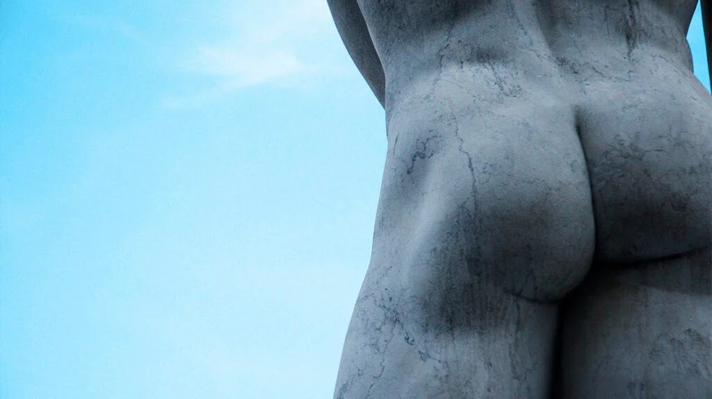 The buttocks of a statue.