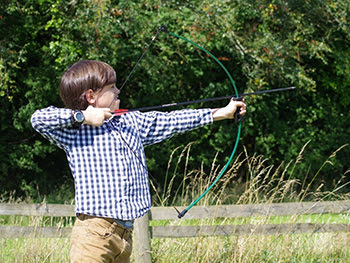 Boy shooting boy and arrow