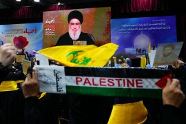 Supporters of the Iranian-backed Hezbollah group raise their fists in salute as they listen to a speech by Hezbollah leader Sayyed Hassan Nasrallah via video link in the southern Beirut suburb of Dahiyeh, Lebanon, Saturday, November 11, 2023 [Hassan Ammar/AP Photo]