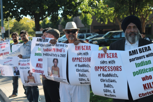 Protesters outside Rep. Bera's district office oppose his reelection on October 28, 2014.