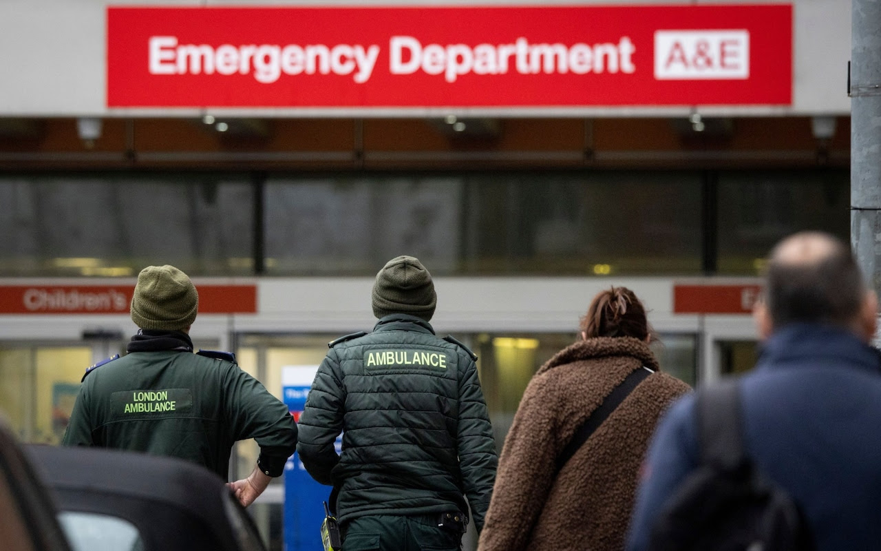 Ambulance workers in front of A&E