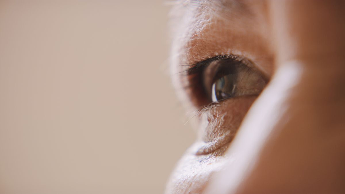 An older women's eye is seen up close.