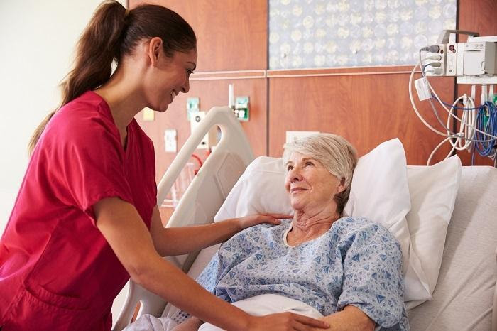 Nurse assisting a patient
