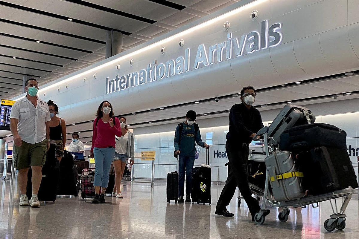 click for large image Passengers from international flights arrive at Heathrow Airport, following the outbreak of the coronavirus disease (COVID-19), London, Britain, on 29 July 2020.