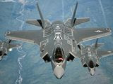 F-35A Lightning II aircraft receive fuel from a KC-10 Extender from Travis Air Force Base, Calif., July 13, 2015, during a flight from England to the U.S. The fighters were returning to Luke AFB, Ariz., after participating in the world&#39;s largest air show, the Royal International Air Tattoo. (U.S. Air Force photo/Staff Sgt. Madelyn Brown) ** FILE **