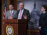 Sen. Tim Kaine, D-Va., center, flanked by Sen. Mike Lee, R-Utah, and Sen. Susan Collins, R-Maine, speaks to reporters just after the Senate advanced a bipartisan resolution asserting that President Donald Trump must seek approval from Congress before engaging in further military action against Iran, at the Capitol in Washington, Wednesday, Feb. 12, 2020. (AP Photo/J. Scott Applewhite)
