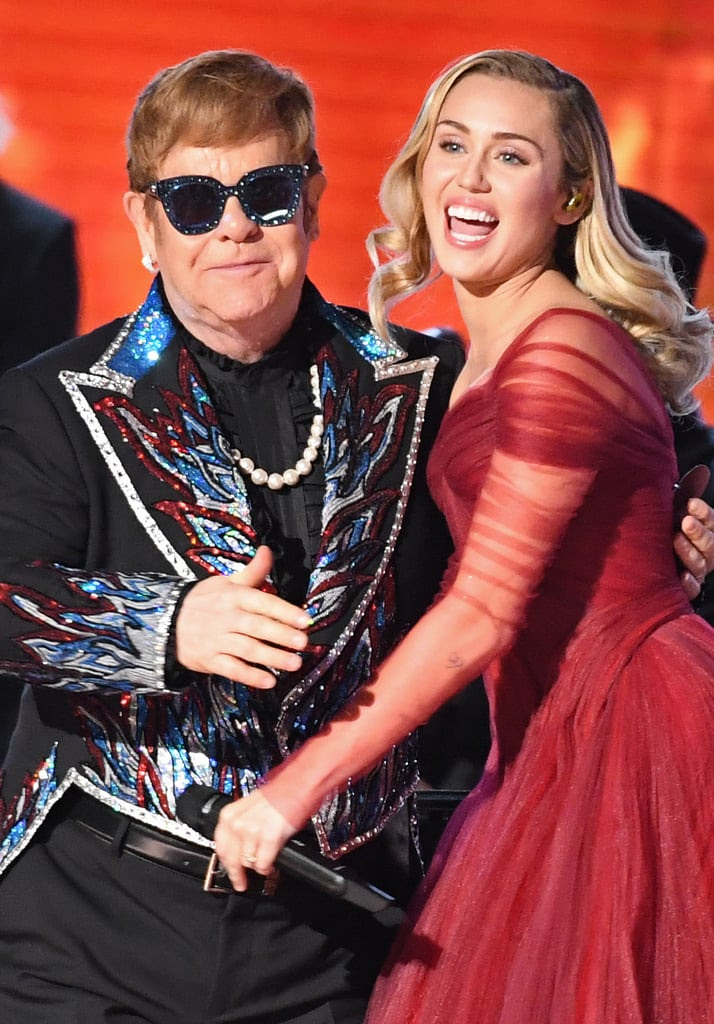 Pictured: Elton John and Miley Cyrus