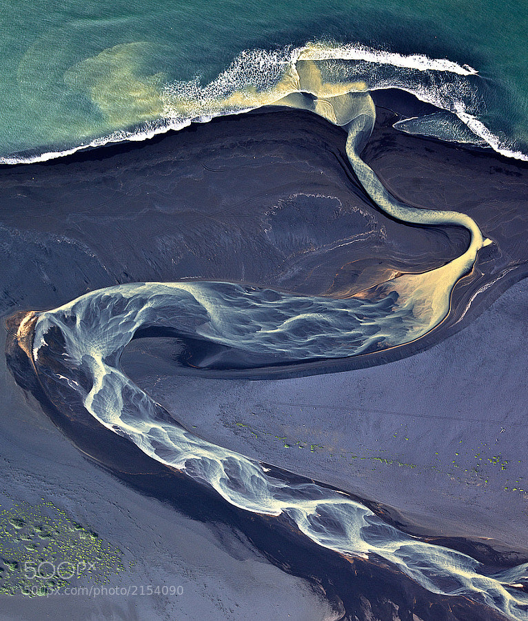 Volcano in Iceland a projection in the river by Andre Ermolaev on 500px