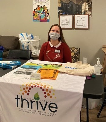 Thrive Central Oregon staffer Abigail Fate at the Madras Community Block Party and Resource Fair.